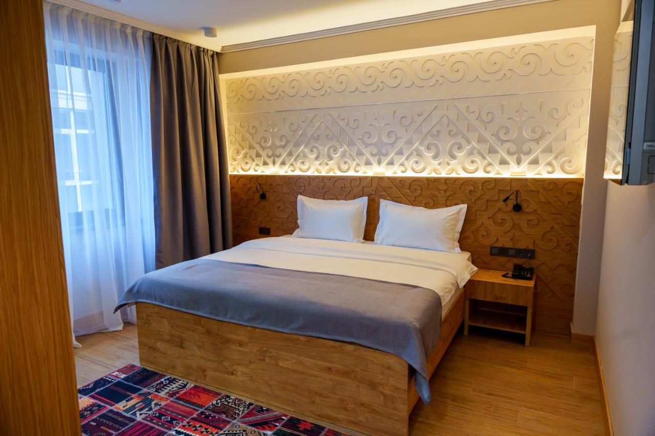 Dami Almaty Hotel Extérieur photo